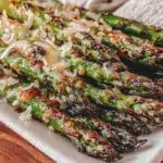 crispy roasted spring asparagus with lemon parmesan - featured image