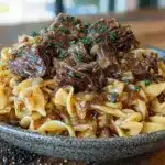 cozy crockpot beef and noodles comfort dinner - featured image